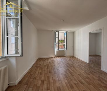 TRIPLEX CENTRE CHARLIEU 66.19 M2 - Photo 2