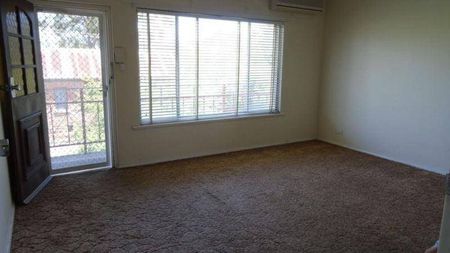 Spacious Upstairs Unit in Prime Location - Photo 2