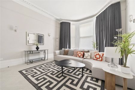 A smart and spacious ground and lower ground fourbedroom maisonette (with outside space) in Southwell Gardens running west off Gloucester Road. Tenancy Length: Minimum 12 months EPC rating C | Council Tax Band F - Photo 2