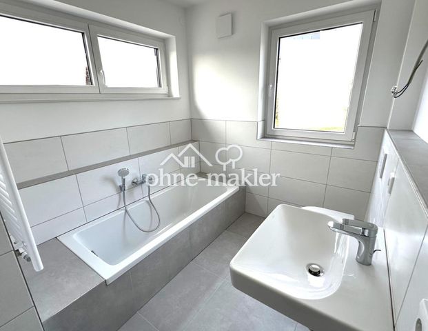 Exklusiver Neubau-Erstbezug: 3-Zimmer-Wohnung mit Einbauküche & Glasfaser in Erlangen-Steudach - Foto 1