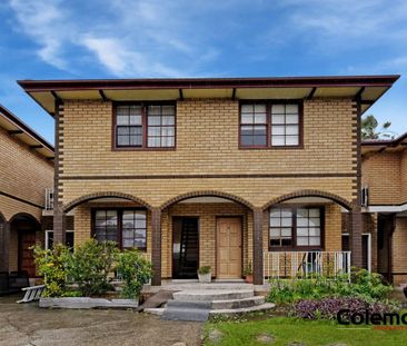 Tidy Townhouse Unit in Quiet Setting - Photo 1