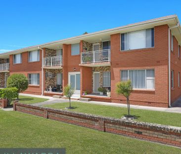 Ground floor 2 bedroom unit - Photo 1