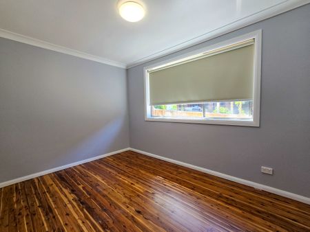 Spacious Family Home with Drive-Through Parking & Outdoor Entertaining - Photo 3