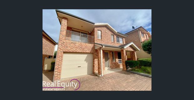 Attractive Townhouse Living with a Low Maintenance Lifestyle - Photo 1