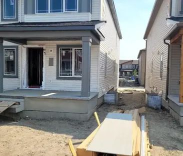 Spacious brand new End-Unit TownHouse in Carrington with attached double-garage | 41 Carringwood Close Northwest, Calgary - Photo 1