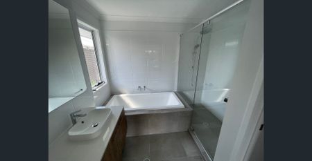 Modern Luxury Living in the Bayside – Spacious 4-Bedroom Family Home - Photo 5