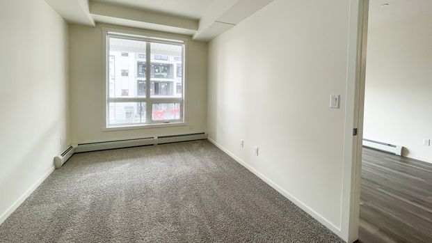 2 Bed Condo With Massive Balcony In Sage Hill – Heat, Water & Underground Parking Included - Photo 1