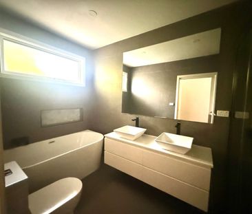 Stylish, Low-maintenance, Four-Bedroom Family Home - Photo 2