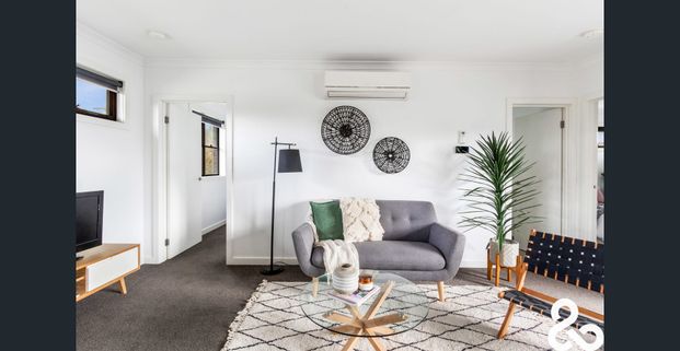 A MUST SEE! Designer Upper-Level Unit in Prime Location - Photo 1