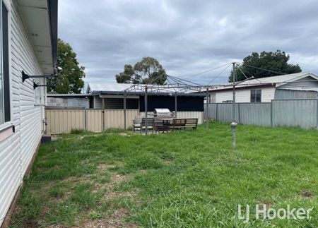 Comfortable Weatherboard Home - Photo 3