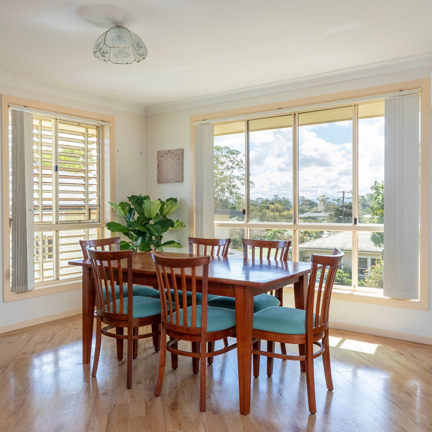 Spacious Family Home with Covered Deck and Convenient Location - Photo 1