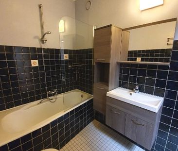 Centraal gelegen 3 slpk-appartement met kelderberging. - Photo 6