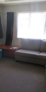 The home features three bedrooms, a spacious kitchen, an open-plan dining and living area and low-maintenance grounds. - Photo 4