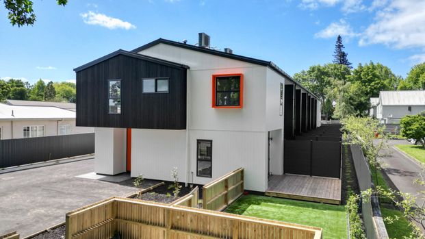 Discover modern living at its finest with this brand-new, architecturally designed townhouse at 18 Stanley Street, Hamilton. - Photo 1