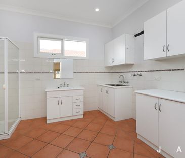 Beautifully Maintained Family Gem with Huge Living Space - Photo 6