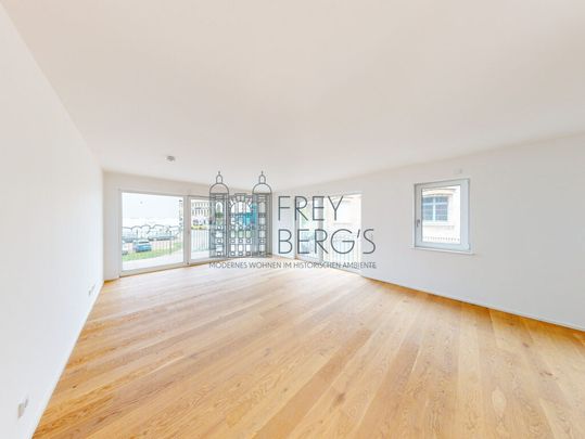 Neubaukomfort: Stilvolle 1-Zimmer-Wohnung mit Einbauküche und Balkon - Photo 1