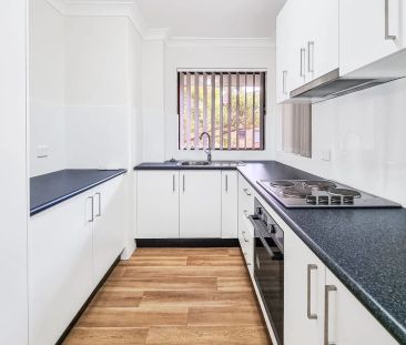 RENOVATED 2 BEDROOM UNIT WITH SPLIT AIR CONDITIONER - Photo 4