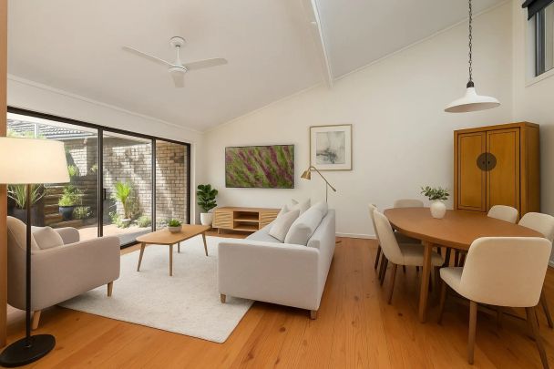 Sunlit Split-Level Townhouse Offering Space, Style & Convenience - Photo 1