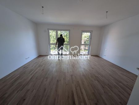 Neubauwohnung exklusiv - Erstbezug mit Balkon, Tiefgarage und Keller - Photo 4