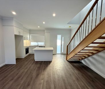 BRAND NEW 2 BEDROOM TOWNHOUSE - Photo 1