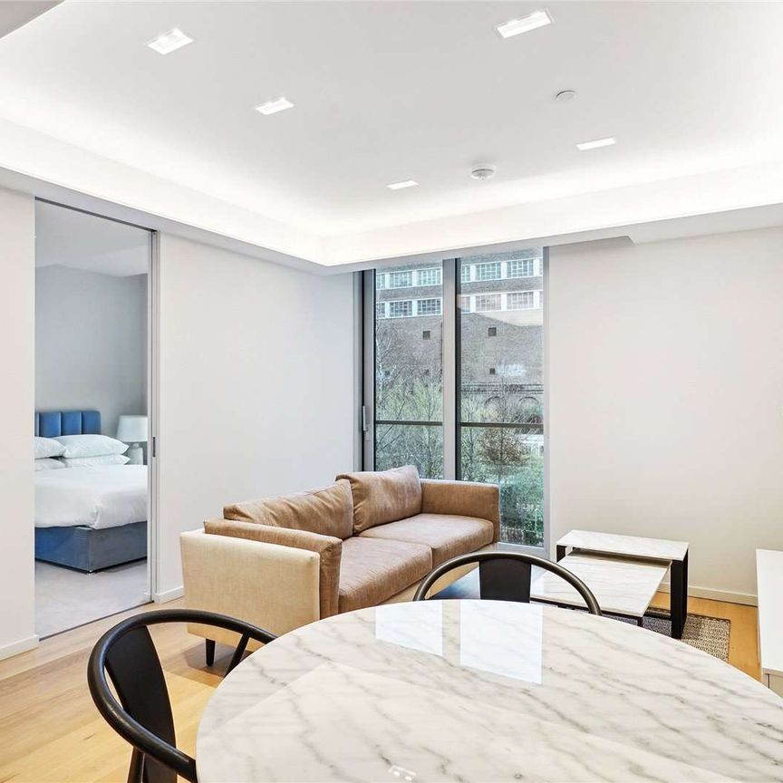 Smart one bedroom flat in situated on the first floor in the Lillie Square development. - Photo 1
