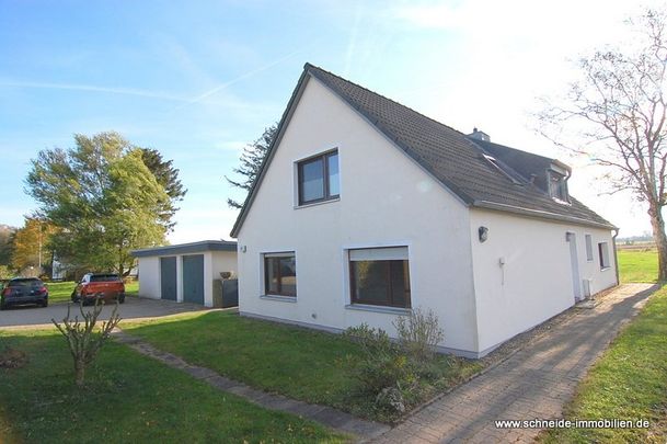 Freundliche 2-2/2-Zimmer-Erdgeschoss-Wohnung mit Terrasse im Gartenanteil - Photo 1