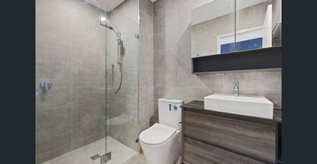 FIRST FLOOR & NEAR NEW THREE BEDROOM APARTMENT WITH STUDY NOOK & TWO CARSPACES - Photo 3