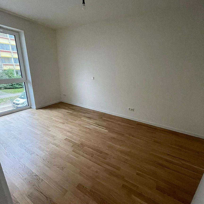 KfW 40-Neubau-Wohnung mit EBK, Balkon, Echtholzparkett, HWR, Fahrstuhl, Tiefgarage - Foto 1