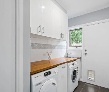 Modern low maintenance living in a prime location. - Photo 1