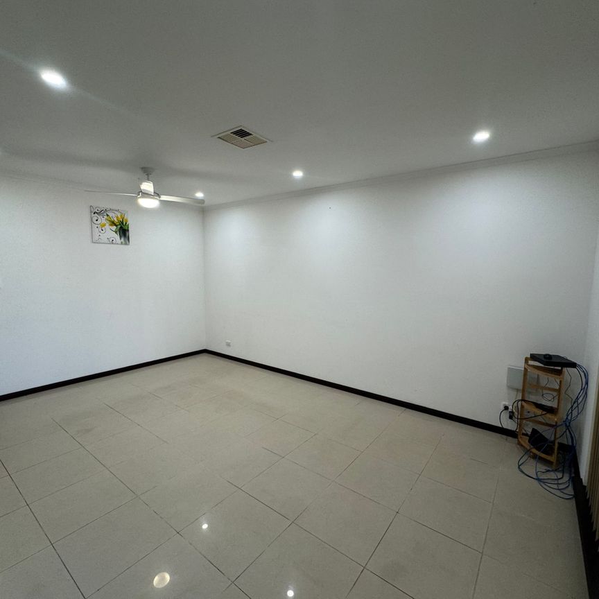 Spacious & Stylish Family Home in a Convenient Location with Solar! - Photo 1