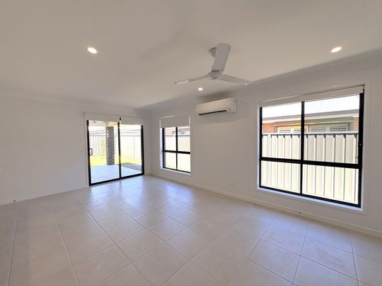 Modern Family Home in Lochinvar - Photo 1