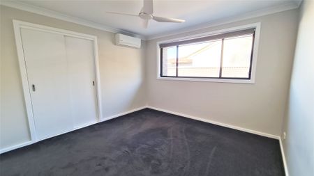 Modern & Low-Maintenance 2-Bedroom Townhouse in Prime Wauchope Location - Photo 4