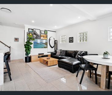 Stylish 3-Bedroom Townhome with Entertainer’s Deck & Modern Kitchen - Photo 3