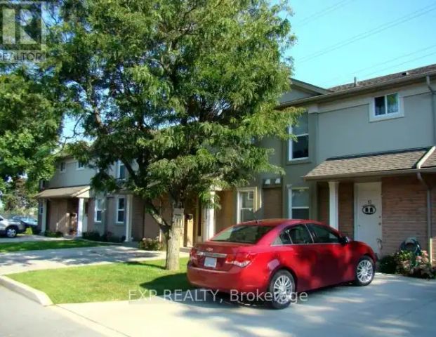 7 - 7591 SCHOLFIELD ROAD — 3 Bedroom - Photo 1