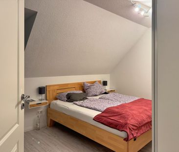 Gemütliche Dachgeschosswohnung mit Balkon in ruhiger und dennoch ze... - Photo 4