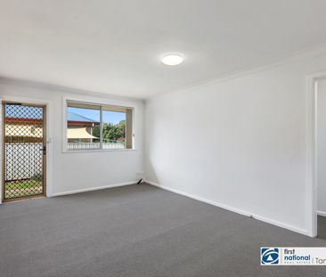 Freshly renovated 2-bedroom unit - Photo 2