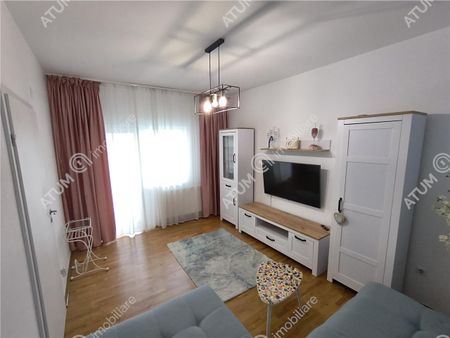 Apartament modern cu 2 camere decomandate balcon si 2 parcari private in Sibiu - Photo 2