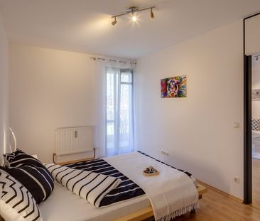 Bright garden apartment with patio for rent - Photo 6