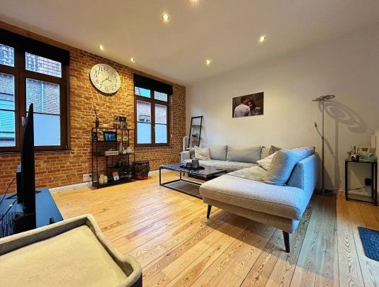 Gezellige rijwoning met koertje en zonnig terras - Foto 1