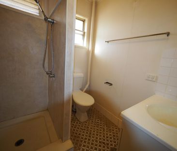 Great Location with AC & Polished Floors - Photo 6