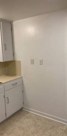 1 bedroom+1 den/ basement suite - Photo 1