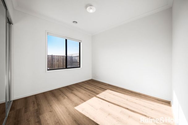 BRIGHT NEAR NEW 4 BEDROOM HOME - Photo 1