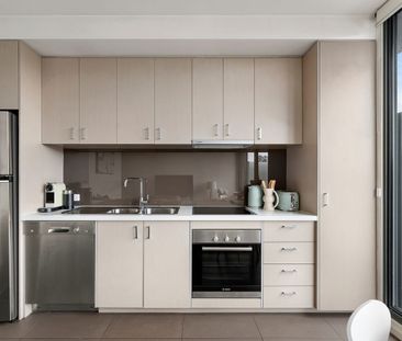 Fully Furnished Top-Floor One-Bedroom with Sweeping Views in the He... - Photo 4