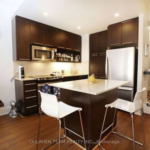 Yonge & Sheppard Bright +Spacious 1Bdrm +Den Open Concept Living Room - Photo 2