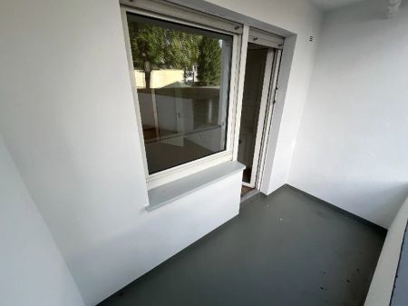 Helle 3-Zimmer-Erdgeschosswohnung mit Balkon in gepflegtem Mehrfamilienhaus - Foto 5