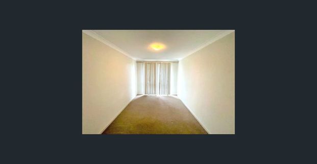 COSY UNIT IN CONVENIENT LOCATION! - Photo 1