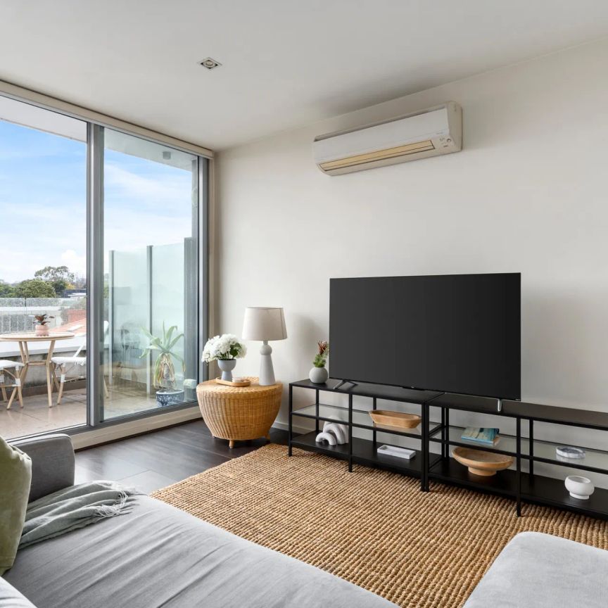 Fully Furnished Top-Floor One-Bedroom with Sweeping Views in the Heart of Malvern - Photo 1