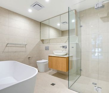 Brand New Split-Level Three-Bedroom Apartment with Huge Entertainer's Courtyard - Photo 3