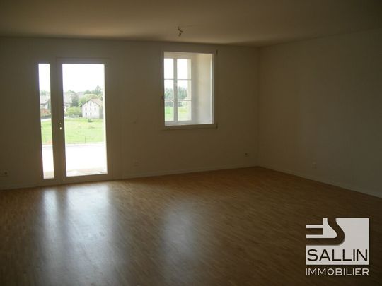 SPACIEUX TRIPLEX 5½ PIECES AVEC PART AU JARDIN - Foto 1