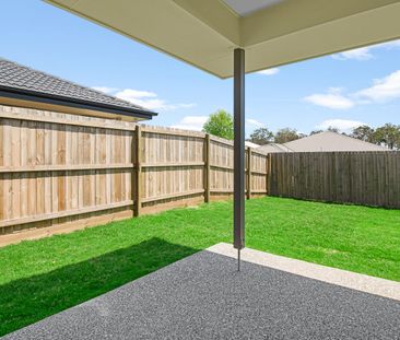 Modern Family Home in Logan Reserve - Photo 5